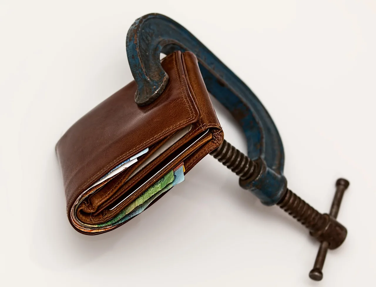 credit squeeze, taxation, purse, tax, economic stress, tight budget, consumerism, currency, inflation, financial difficulty, finance, cash, debt, bankruptcy, economy, crisis, savings, expenses, recession, money, wallet, tax, inflation, inflation, inflation, inflation, inflation, debt, debt, debt, recession, money, money, wallet. The real cost of insuring a tax preparation business for a small operation