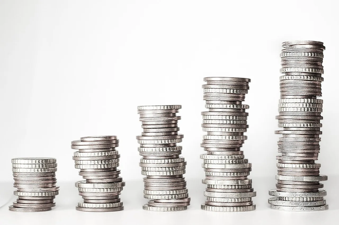 money, coins, stack, stacked coins, loose change, growing money, money tower, euro, currency, cash, metal money, finance, silver, wealth, prosperity, concept, idea, money, money, money, money, money. Houston taxpreparer guide to IRS filing deadlines